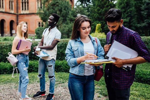 Three Students Talking Each Other Outdoor College Courtyard 496169 60